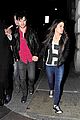 taylor lautner marie avgeropoulos matching jackets london 26